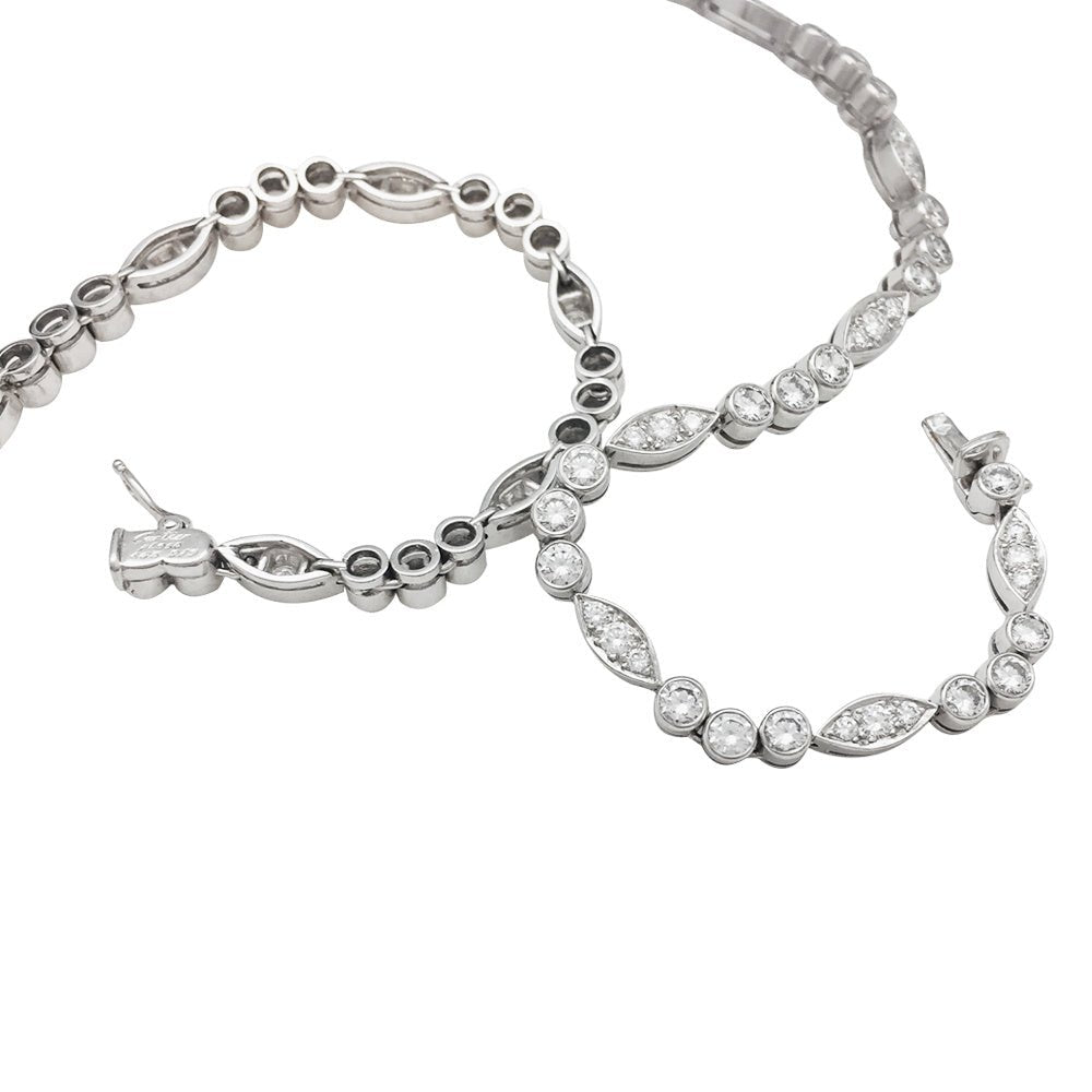 Collier CARTIER "Dentelle" en platine, or blanc et diamants - Castafiore