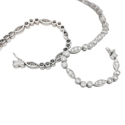 Collier CARTIER "Dentelle" en platine, or blanc et diamants - Castafiore