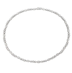 Collier CARTIER "Dentelle" en platine, or blanc et diamants - Castafiore