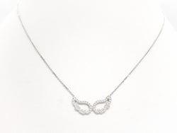 Collier Pendentif Aile d'ange en or blanc et diamants - Castafiore