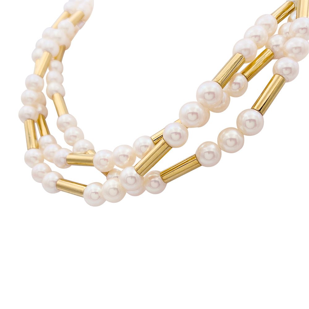 Collier Poiray, "Fuseau", or jaune, perles. - Castafiore