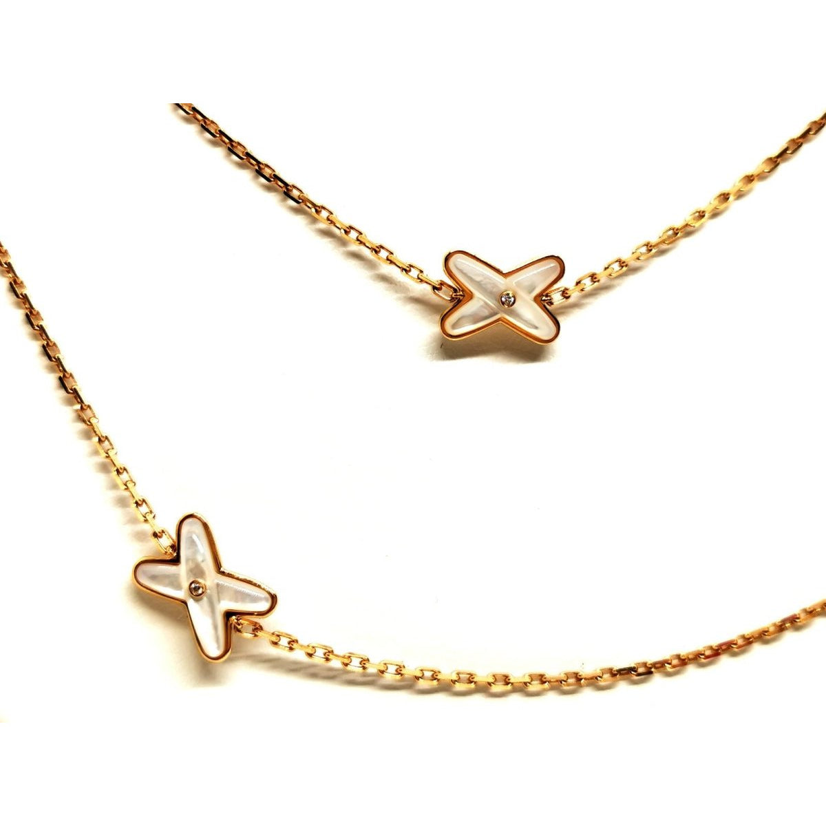 Collier Sautoir CHAUMET "Jeux de liens" en or rose, nacre et diamants - Castafiore