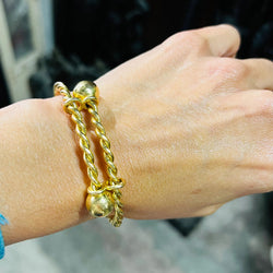 Bracelet jonc en or jaune torsadé