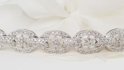 Bracelet ajouré en or blanc et diamants