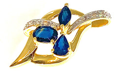 Pendentif en or 18 carats serti de 3 saphirs poires et de 10 diamants