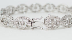 Bracelet ajouré en or blanc et diamants