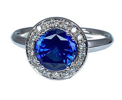 Bague de fiançailles en or blanc 18 carats en saphir et diamants