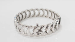 Bracelet Collection C de Cartier en or blanc et diamants