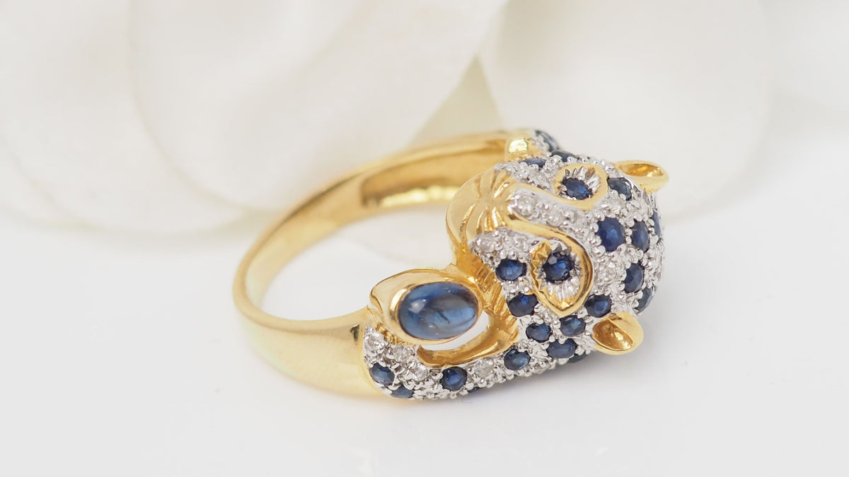 Bague Panthère en or jaune, saphirs et diamants