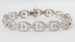 Bracelet ajouré en or blanc et diamants