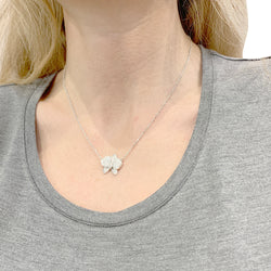 Collier Cartier, "Caresse d'Orchidées", or blanc, diamants