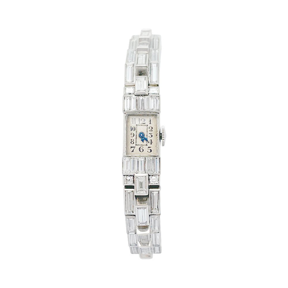 Montre Art Déco en platine et diamants. - Castafiore