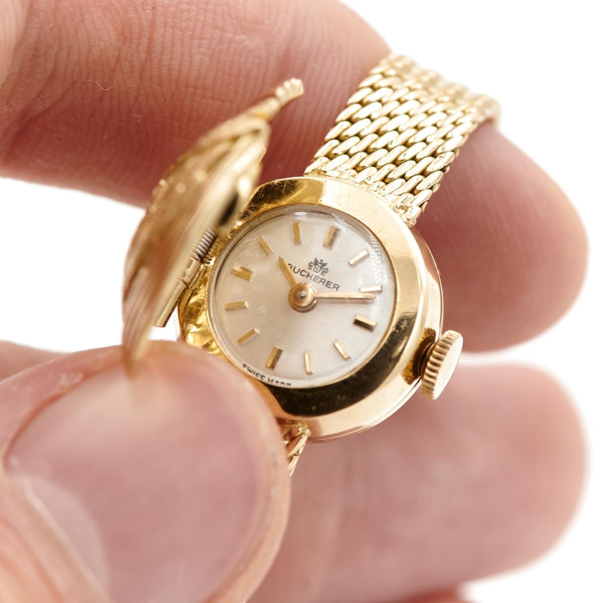 Montre BUCHERER dame à secret, en or jaune - Castafiore