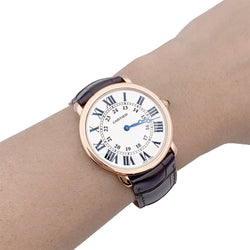 Montre Cartier, "Ronde Louis Cartier", or rose, cuir. - Castafiore