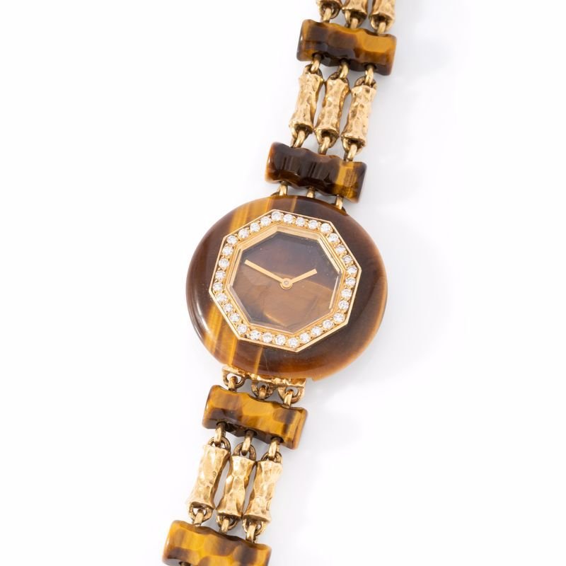 Montre de dame en or jaune et oeil du tigre - Castafiore