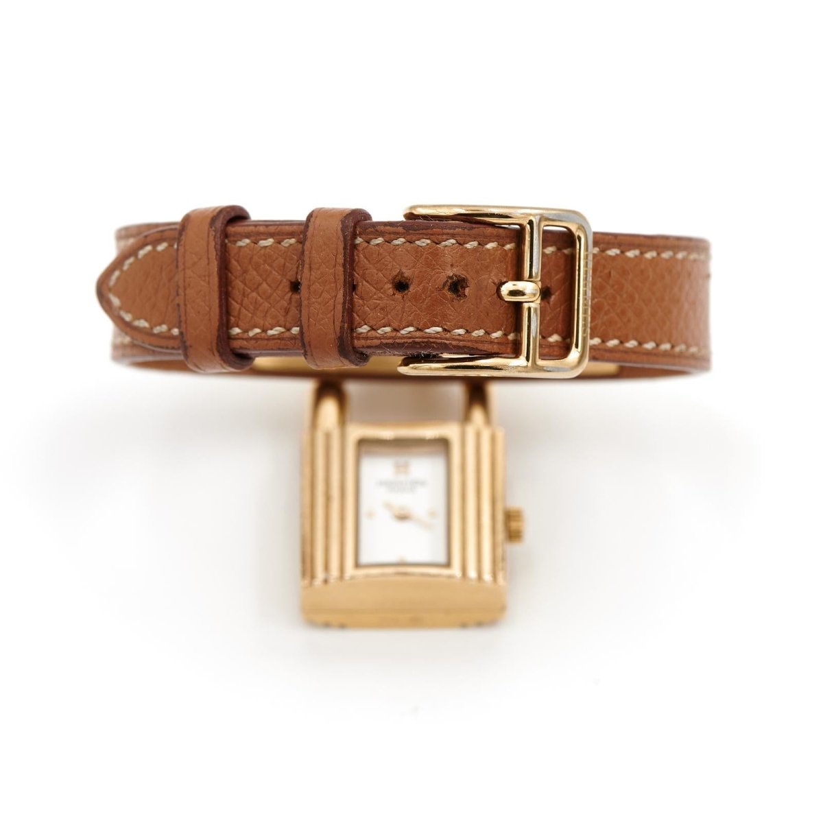Montre HERMÈS "Kelly" plaqué or et cuir marron - Castafiore