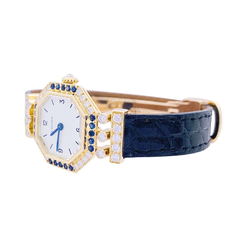 Montre Mécanique CARTIER "Andine" en or jaune, or rose, cuir saphirs et diamants - Castafiore