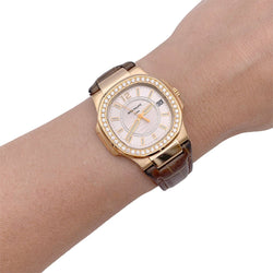 Montre Patek Philippe, "Nautilus", or rose, diamants, cuir. - Castafiore