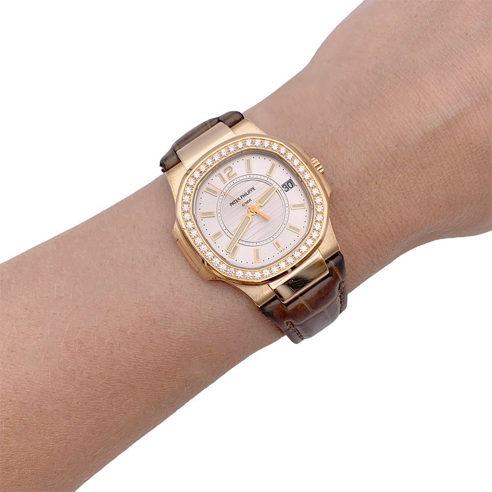 Montre Patek Philippe, "Nautilus", or rose, diamants, cuir. - Castafiore