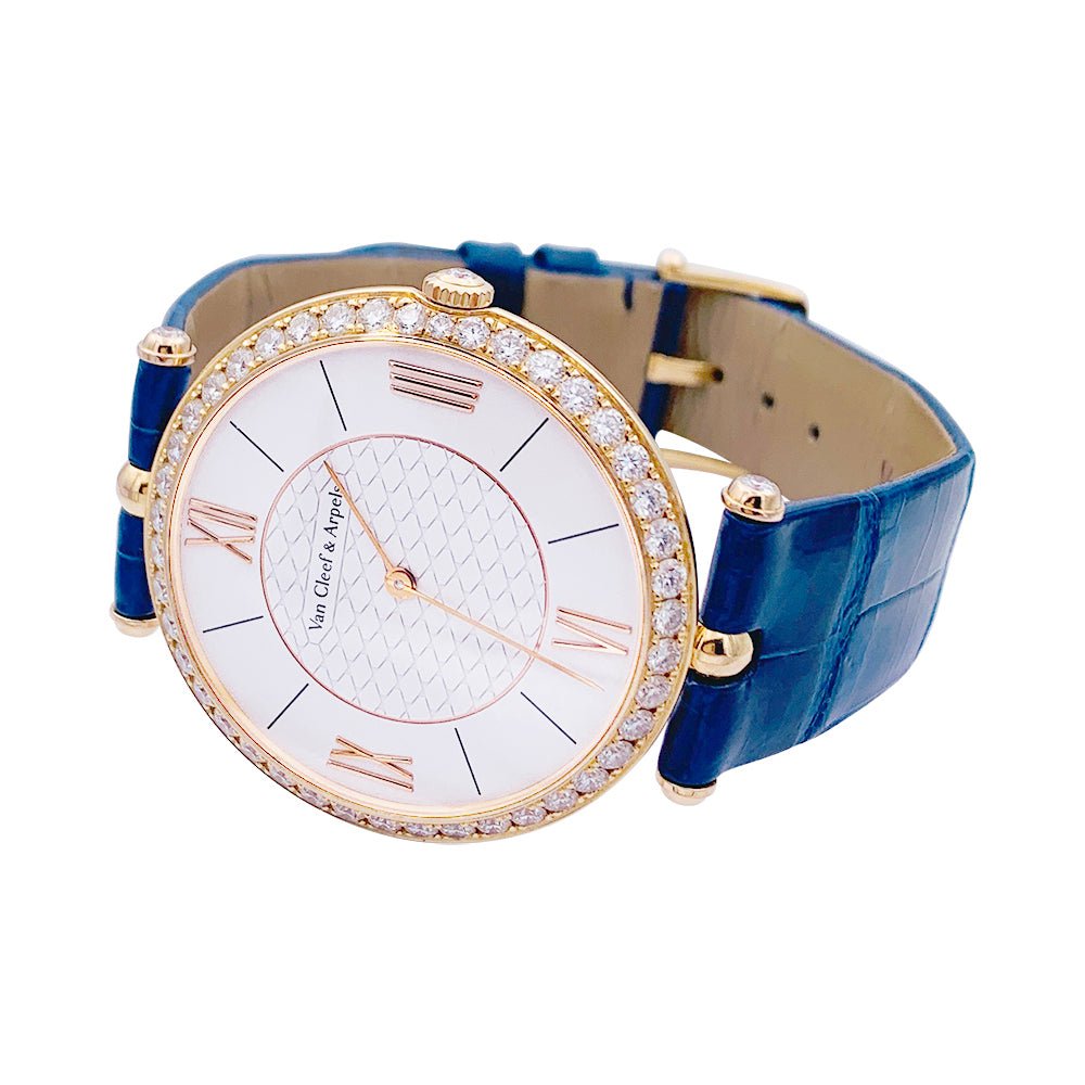 Montre VAN CLEEF & ARPELS "Pierre Arpels"en or rose, diamants et cuir - Castafiore