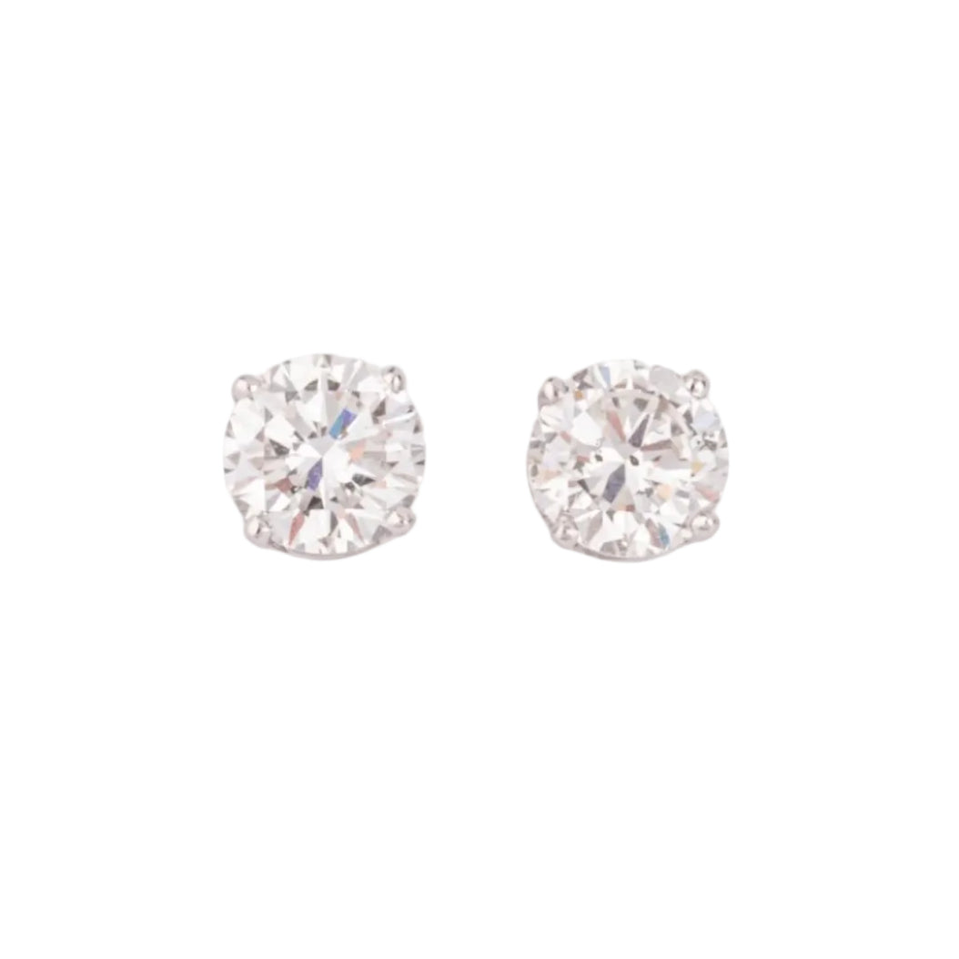 Paire de puce en diamant sur or gris 4 griffes - Castafiore