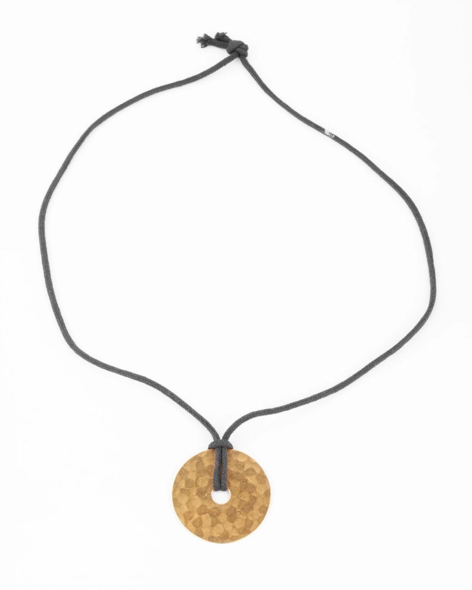 Pendentif martelée de la maison Dinh Van modèle cible - Castafiore