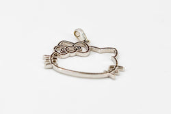 Pendentif VICTORIA CASAL Hello Kitty, en or blanc et diamants - Castafiore